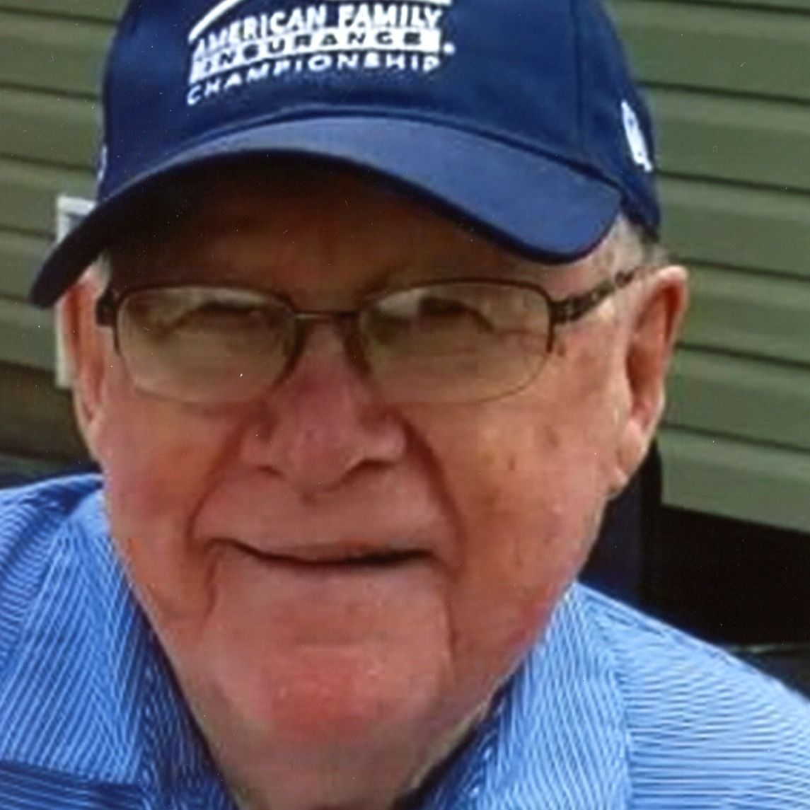 John W. Scharer's obituary photo'