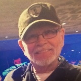 Rolland Specht's obituary photo'