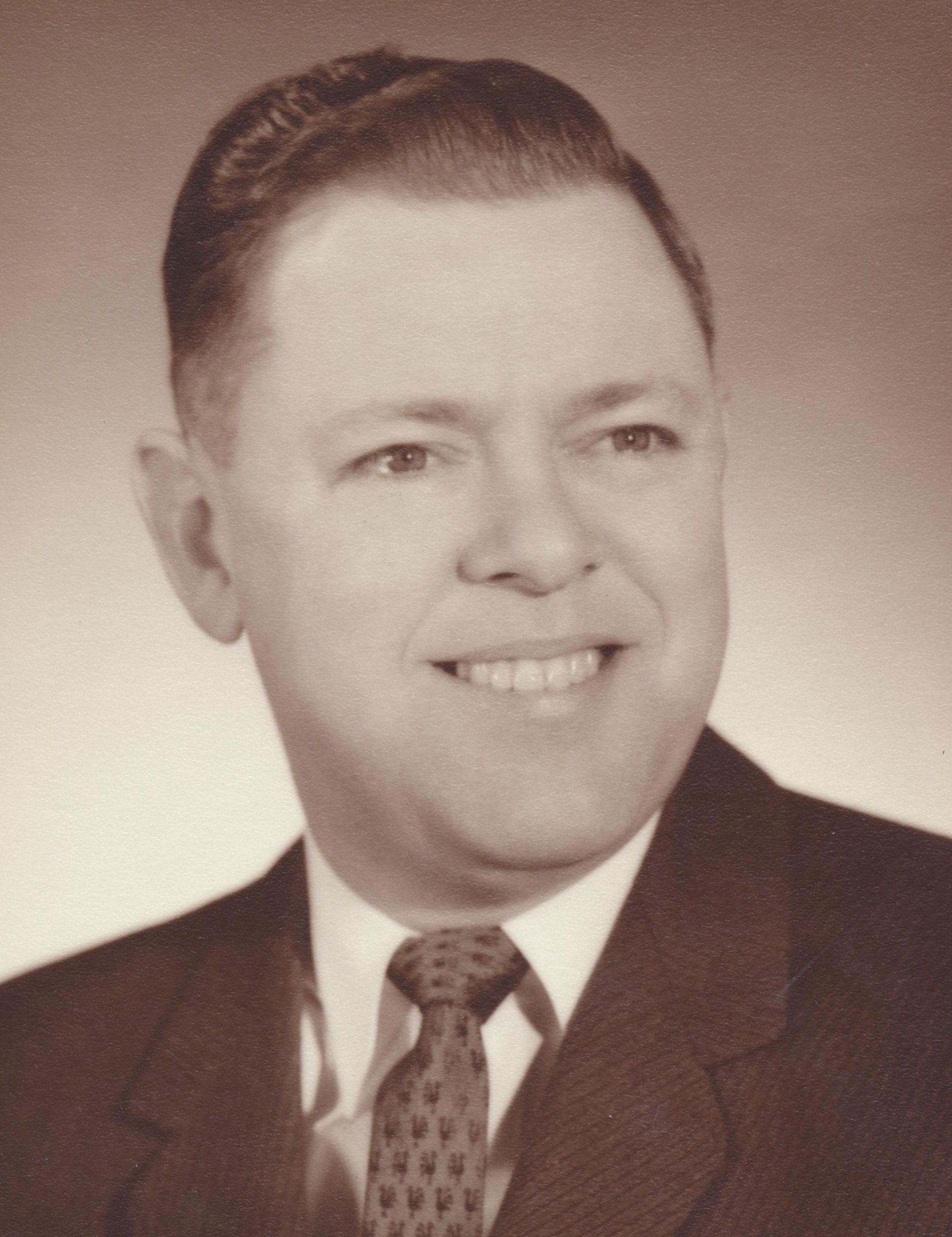 Frank L Holliday