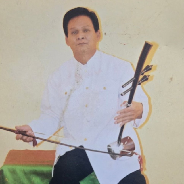 Tam Pom's obituary photo'