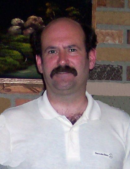 Mark L Yelk
